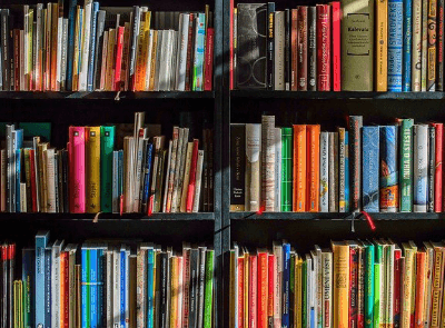 Book shelf filled with books.