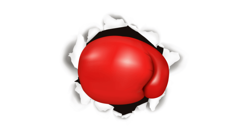 A red boxing glove punches through a wall.