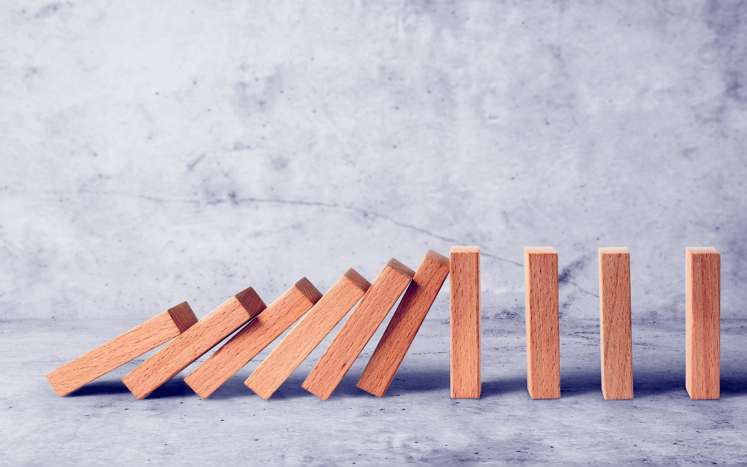 A row of dominoes falling over. It illustrates the physical chain reaction set off my emotions.