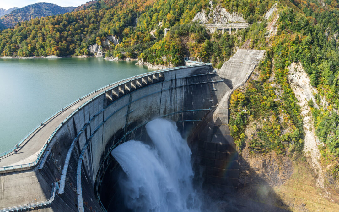 Water gushes out of a dam.