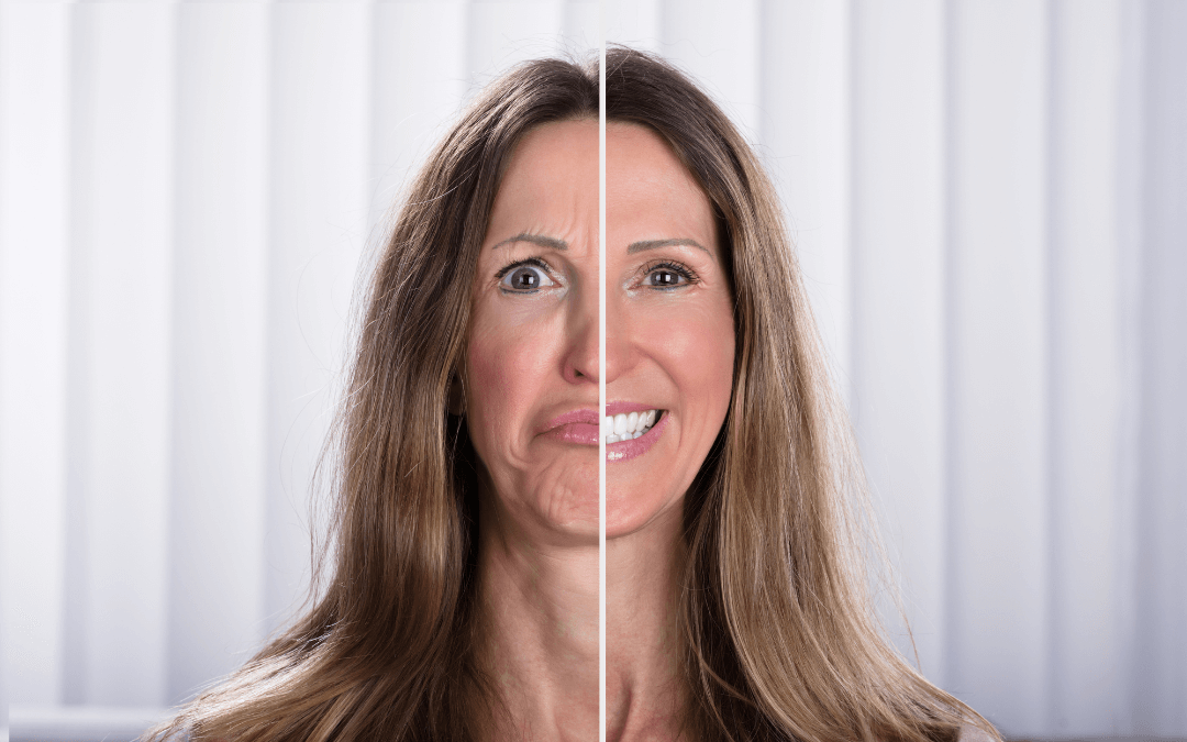 A woman's face split in two. On the left, she is sad, on the right she is happy.