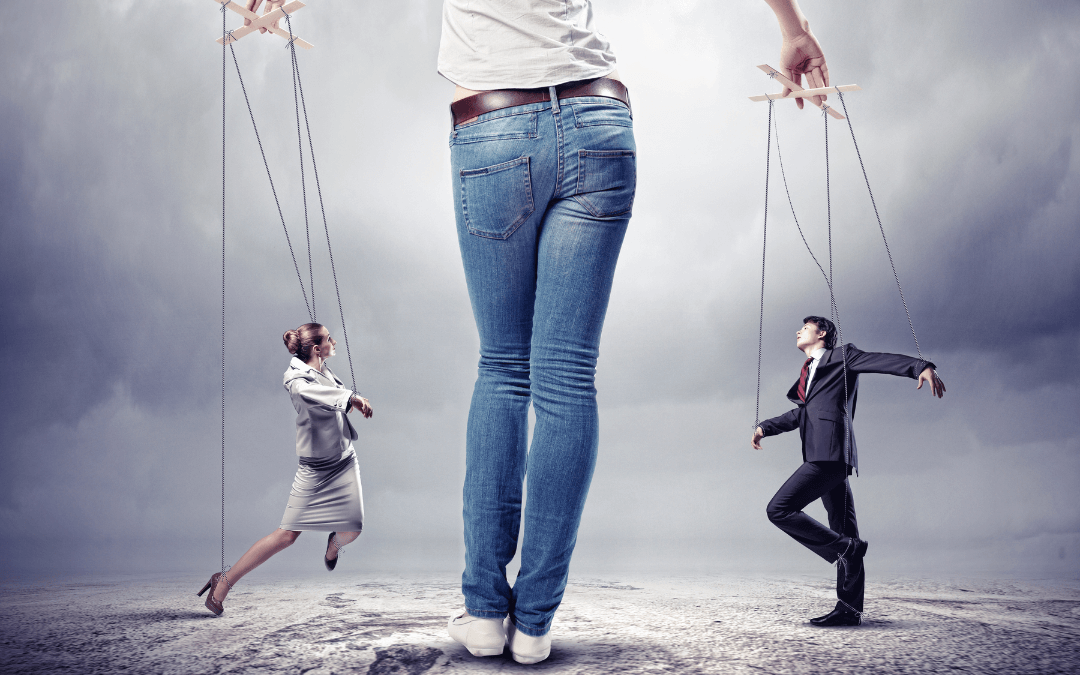 Two people are tied to strings. They are puppets moved by a third much bigger person. 