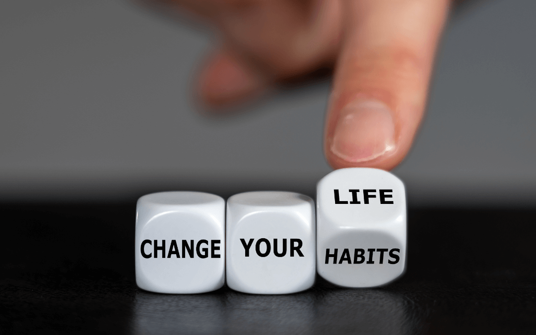 Change your habits, change your life written on dices.