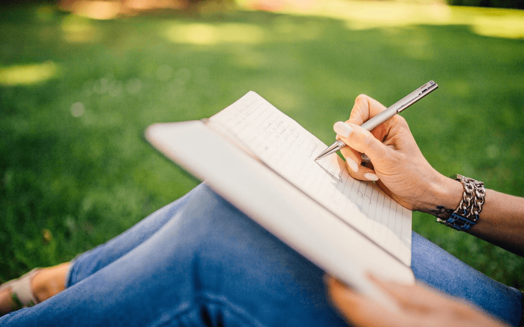 A woman journaling.